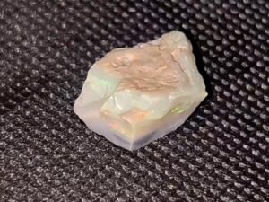 11.5ct Lightning Ridge Multi Color Seam Opal with Amazing color on Dark/Black